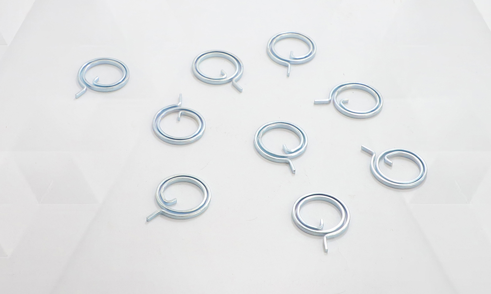 Exploring the Mechanics of Spiral Springs